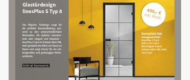 Linesplus Glastüre im Industriedesign eingebaut in einer schwarzen Zarge in gelbe Wand